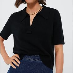 On-Trend And Elegant As Ever, The Black Henry Polo Is An Elevated Basic That Deserves A Spot In Your Closet. Crafted From A Smooth, Slightly Textured Luxe Knit, This Must-Have Top Combines Effortless Style And Comfort With Its Relaxed Yet Cropped Fit And Classic Polo Collar. Pair It With Jeans And Sneakers For An Everyday Casual Look, Wear It With Tailored Trousers And Ballets For Work, Or Style It With Skirt And Heels For A Cute Date Night 'Fit. Collared V-Neck Short Sleeve Ribbed Cuffs And Hem Trendy Black Top With Collared Neckline, Black Fine Knit V-neck Top, Black Tops With Ribbed Collar For Work, Chic Black Tops With Seamless Collar, Chic Black Top With Seamless Collar, Classic Black Fine Knit Top, Black Knit Tops For Workwear, Black Knit Tops For Work, Casual Black Knit Top With Ribbed Collar