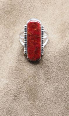 Gorgeous Red Sponge Coral Ring US Size 10. Can be re-sized for no additional charge  Top:  31 mm x 14 mm; 1-1/4" x 1/2" Weight 8.5 grams Sterling silver 925, Handmade $85 Exclusively designed by Richard James for richlo jewelry Check out our other fine jewelry at  https://www.etsy.com/shop/arizonagemstudio Coral is highly-prized as a substance believed to be endowed with mysterious sacred properties. It is a symbol of modesty, wisdom, happiness and immortality. Richard James, Sponge Coral, Coral Ring, Us Size 10, 925 Silver Ring, Colorful Wallpaper, 925 Silver Rings, Rings Statement, Ring Gift