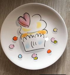 a plate with a cupcake drawn on it