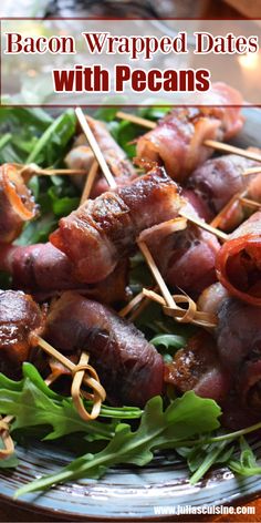 bacon wrapped dates with pecans on a bed of lettuce and garnished with toothpicks