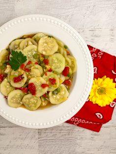 a white bowl filled with fruit and vegetables