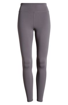 Work out or chill out in these stretchy leggings cut with a supportive wide waistband. 27" inseam; 7" leg opening; 9 1/2" front rise Pull-on style Hidden back waist pocket 75% nylon, 25% spandex Machine wash, tumble dry Imported Mid-rise 4-way Stretch Athleisure Leggings, Go-dry Stretch Leggings, Mid-rise Stretch Leggings With Go-dry Technology, Stretch Go-dry Leggings, Comfort Stretch Go-dry Leggings, Gray Compressive Leggings, 4-way Stretch Leggings For Pilates, Go-dry Full Length Leggings For Loungewear, Gray Full Length 4-way Stretch Leggings