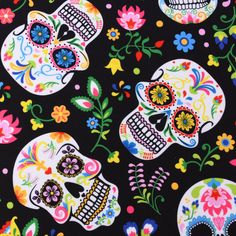 colorful skulls and flowers on black background for day of the dead fabric or wallpaper