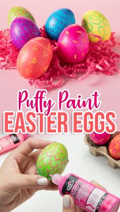 a hand holding an egg next to some fake eggs with the words puffy paint easter eggs