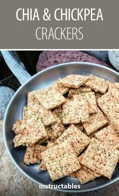 crackers in a metal bowl with the title text overlay reads, chia and chickpea crackers