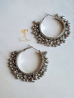 Bollywood Ghungroo hoops. Lightweight earrings with ghungroo beads Pair with Kurt's or tops for a fun, effortless statement look! ✓As always this is a high quality piece. Our Jewelry does not tarnish. Please keep in airtight container away from moisture and fragrances. ✓Free shipping in USA over $35. ✓Please ask all questions regarding color, size, measurements etc before you buy ✓ Please note that the ethnic Indian/Pakistani earring posts are usually thicker than normal. If you are not used to Festive Bohemian Metal Hoop Earrings, Metal Hoop Earrings For Festivals, Silver Bohemian Hoop Earrings For Celebration, Oxidized Finish Hoop Earrings For Festivals, Bohemian Hoop Earrings With Dangling Beads For Festive Occasions, Festival Dangle Metal Hoop Earrings, Festive Metal Hoop Earrings With Latkans, Festival Metal Dangle Hoop Earrings, Nickel-free Dangle Hoop Earrings For Festive Occasions