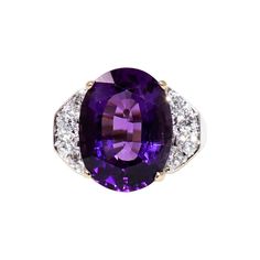 Ring size 7.25 Breathtaking amethyst and diamond cocktail ring bursting with sparkle! This stunning statement piece features a large oval mixed cut amethyst stone in a beautifully saturated purple color. The gorgeous purple stone is vertically set and flanked by icy white diamonds in a crescent shape. It radiates beautifully on the finger while making an impressive and bold statement. This incredible 8.41 carat amethyst stone is prong set in polished 14 karat yellow gold setting. Bright white na Luxury Large Oval Amethyst Ring, Oval Stone Rings, Cocktail Ring Designs, Amethyst Cocktail Ring, Diamond Cocktail Ring, Bold Rings, Crescent Shape, Diamond Cocktail Rings, Yellow Gold Setting