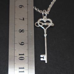 "Polyamory Key Necklace for Women Base Material: 925 Sterling Silver Size: 20mm X 25mm (Approximately) Chain Length: 16'' - 24'' Inches Thickness: 1.5mm Metal Stamped: 925 You'll receive Order Shipped Email from us when your item is completed and shipped. SPECIAL ANNOUNCEMENT 1. Please visit https://www.etsy.com/shop/yhtanaff for more designs. 2. Subscribe our newsletter to receive a Coupon Code for 10% discount. \"At Our Shop Profile's Announcement Section\" 3. Please LIKE our Facebook Fan Page Symbolic Sterling Silver Necklaces For Valentine's Day, Symbolic Sterling Silver Jewelry For Valentine's Day, Silver Symbolic Necklace For Valentine's Day, Infinity Symbolic Jewelry For Gift, Symbolic Silver Jewelry For Valentine's Day, Symbolic Infinity Jewelry For Gift, Symbolic Infinity Jewelry For Gifts, Symbolic Jewelry For Valentine's Day Anniversary, Engraved Infinity Jewelry For Valentine's Day