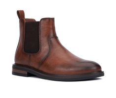 Indulge in timeless sophistication with our Ryder Chelsea boots, embodying effortless style and versatility. The classic silhouette, coupled with elastic side panels for easy on and off, ensures both comfort and elegance. With its sleek design, these boots add a touch of refinement to any ensemble, elevating your look effortlessly. Faux Leather, Elastic Gore upper, Pull on, Slip on entry,5.5\ shaft height, Round Toe, Polyester footbed, Thermoplastic Rubber (TPR) outsole | Men's Reserved Footwear Classic Slip-on Spring Boots, Classic Slip-on Boots For Spring, Classic Slip-on Chelsea Boots For Fall, Spring Classic Chelsea Boots With Round Toe, Classic Slip-on Boots With Round Toe, Fitted Chelsea Boots With Plain Toe For Fall, Fitted Casual Chelsea Boots For Business, Casual Fitted Chelsea Boots For Business, Classic Fitted Slip-on Boots