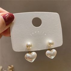 Gender : Women Shape\pattern : HEART Style : Cute/Romantic Material : zinc Alloy Metals Type : zinc Alloy Brand Name : YIYUEQIANLI CN : Hubei Item Type : EARRINGS Earring Type : drop earrings Fine or Fashion : fashion Colour : White Style : Women Texture of wood : Metal Modelling : Heart-shaped WHAT ABOUT REFUND?   Fast refund,100% Money Back Guarantee. If your product is defective or doesnt work properly, let us know and well send you a replacement one. We believe in our products so much that w Circle Jewelry, Romantic Earrings, Brown Earrings, Korean Jewelry, Body Chains, Unusual Earrings, Heart Drop Earrings, Girly Jewelry, Pearl Stud Earrings