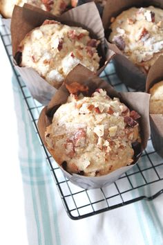 several muffins are sitting on a cooling rack