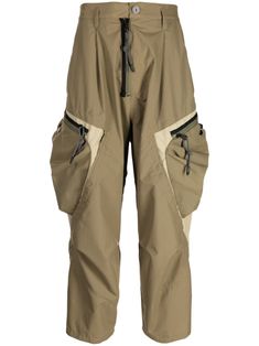 khaki/beige two-tone design patch detail belt loops front button and zip fastening high waist straight leg two side inset pockets two side zip-fastening pockets two rear flap pockets Khaki Techwear Pants With Patch Pockets, Khaki Techwear Pants With Functional Pockets, Khaki Techwear Parachute Pants With Patch Pockets, Khaki Parachute Trousers With Patch Pockets, Khaki Parachute Pants With Patch Pockets, Nylon Khaki Pants With Pockets, Khaki Nylon Pants With Pockets, Pocket Pants, Workout Pants