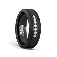 a black ring with white diamonds on the inside and inlayed to it's center