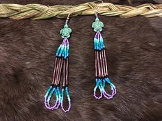 Authentic Beautiful Native American Indian Jewelry Navajo Hand Beaded Long Dangle Earrings. Great for a gift❤️ Handcrafted by Navajo Artist R. Sellers These beautiful earrings are 5" in length and 1" in width. Adjustable Southwestern Beaded Earrings With Ear Wire, Artisan Adjustable Hand-strung Earrings, Adjustable Hand-strung Earrings For Festivals, Southwestern Style Beach Jewelry With Dangling Beads, Southwestern Dangle Beaded Earrings, Artisan Hand-strung Dangle Earrings, Southwestern Adjustable Dangling Bead Earrings, Adjustable Southwestern Beaded Earrings For Beach, Adjustable Southwestern Beaded Earrings