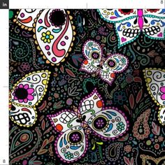 colorful sugar skulls and butterflies on black background