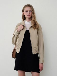 Editor's notesThis jacket is made of cotton. The minimal design makes the coat clean and neat. It features a dropped shoulder and semi-cropped length. As a relaxed silhouette, it can be worn regardless of body type.- Casual mood bomber jacket- 2-way zip-up style and a comfortable fit - Banding hem detail and easy to coordinate - Point collar and pockets detail Measurements(in.)One size (XS-M)- Total length: 21.25 in. - Shoulder: 20.07 in.  - Chest: 23.03 in. - Sleeve length: 21.45 in. * Model info: Height 5'67, Bust 30.70, Waist 21.25, Hips 34.25, Shoes (US) 7.5 (KR) 245MMComposition & Care- Shell: 100% Cotton - Dry Cleaning recommend Designer- by LOEIL Minimalist Long Sleeve Outerwear For Work, Minimalist Long Sleeve Fall Outerwear, Modern Cotton Outerwear For Everyday, Beige Cotton Cropped Jacket For Work, Long Sleeve Cotton Cropped Jacket For Everyday, Everyday Long Sleeve Cropped Cotton Jacket, Cotton Long Sleeve Cropped Jacket For Everyday, Khaki Cotton Cropped Jacket For Work, Modern Solid Cotton Outerwear