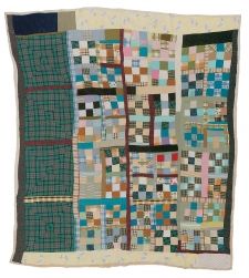 an old patchwork quilt is displayed on a white background