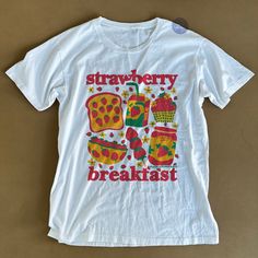 Strawberry Breakfast Tee is a cute strawberry shirt to have when you're a strawberry lover. Inspired by retro aesthetic and kawaii aesthetic - this cute kawaii strawberry shirt surely is the perfect strawberry shirt to wear wherever you go - may it be at the park, at work, school or anywhere you go. This retro t shirt is an all original illustration by MilkDesignsShop. It can be a gift for her, gift for him or anyone in between who loves strawberry as this cute shirt is unisex. Available in XS, Kidcore Clothing, Strawberry Breakfast, Y2k Shirts, Kawaii Strawberry, Strawberry Shirt, Kawaii Clothing, Weird Shirts, Retro T Shirt, Statement Shirt