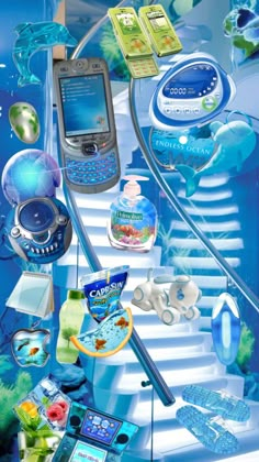 a cell phone sitting on top of a set of stairs in front of an aquarium