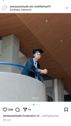 an image of a person wearing a graduation cap and gown sitting on a ledge in front of a building