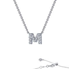 The Lafonn Letter M Pendant Necklace showcases a shimmering silver pendant adorned with simulated diamonds. The chain includes an adjustable clasp and is finished with a small round charm at the end, all beautifully set against a pristine white background. Letter M Necklace, Nickel And Suede, M Necklace, Diamond Initial Necklace, Letter Pendant Necklace, Letter M, Letter Pendants, Block Lettering, Letter Necklace