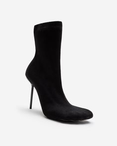 The 110mm lacquered stiletto heel Anatomic Boot is available now in black ribbed knit.​ Black Balenciaga, Winter 23, Balenciaga Shoes, Stylish Boots, Airport Fashion, Black Rib, Stiletto Heel, Biker Boot, Bootie