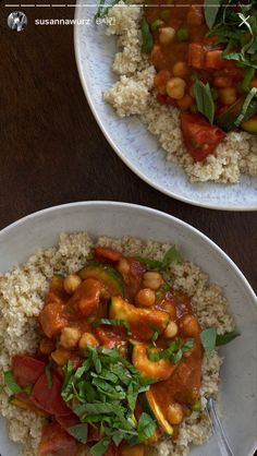 two plates filled with rice and vegetables on top of a wooden table next to each other