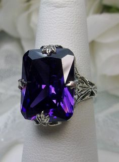 10ct Rectangle Purple/Amethyst CZ Solid Sterling Silver Art Deco Filigree Ring Size (Made to order) (Design #15) https://etsy.me/2nYEd1Q #jewelry #ring #silver #etsy #loveetsy #shopsmall #yes #purple #cubiczirconia #floral #rectangle Classic Purple Square Cut Ring, Classic Amethyst Rectangular Ring For Anniversary, Classic Rectangular Amethyst Ring For Anniversary, Formal Purple Rings With Rectangular Stone, Elegant Purple Crystal Ring For Party, Purple Rectangular Ring Gift, Elegant Purple Crystal Party Ring, Purple Rectangular Stone Ring For Anniversary, Purple Rings With Rectangular Stone For Anniversary