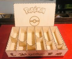 a wooden box that has some sort of pokemon in it