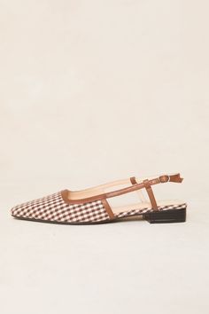 Unleash your inner fashionista with our Ingrid Slingback Flat! These brown gingham flats with brown trim will add a touch of whimsy to any outfit. The square pointed toe provides a unique twist, while the adjustable buckle at the side ankle ensures a comfortable and secure fit. Perfect for adding a playful touch to your fall wardrobe!*This style is running large, we recommend sizing a full size down Brown Low Heel Slingback Pumps For Spring, Brown Spring Slingback Pumps With Square Toe, Brown Square Toe Slingback Pumps For Spring, Brown Gingham, City Woman, Slingback Flats, Ankle Heels, Brown Trim, The Square