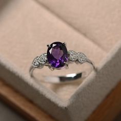 Purple amethyst ring sterling silver February birthstone | Etsy Elegant Oval Amethyst Promise Ring, Classic Oval Amethyst Ring With Diamond, Elegant Oval Amethyst Birthstone Ring, Classic Oval Purple Birthstone Ring, Classic Oval Amethyst Ring With Accent Stones, Silver Oval Solitaire Amethyst Ring, Silver Solitaire Oval Amethyst Ring, Oval Amethyst Promise Ring In White Gold, Classic Oval Amethyst Ring With Halo Setting