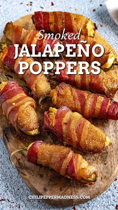 Smoked Jalapeño Poppers on a wooden board Smoked Stuffed Jalapenos, Smoker Jalapeno Poppers, Traeger Jalapeno Poppers, Smoked Recipes Smokers Ideas, Smokey Appetizers, Smoked Appetizers For Party, Smoked Recipes Smokers, Master Built Smoker Recipes, Camping Sides