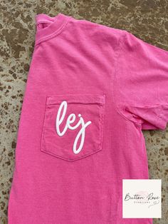 *New New New* 🖤3D Puff Embroidered Pocket Monogram T-Shirt 🖤  Customize this soft and comfy T-shirt! Choose your monogram font style, T-shirt color and thread color! Pocket T-Shirt Features: -Brand: Comfort Colors - 100% Soft Ring-Spun Cotton -Unisex Relaxed Fit Pocket T-Shirt -Sizes: S - 3XL -Available in a variety of colors - (Colors/shades may vary from shirt to shirt due to the pigment dye process.) -Made with OEKO-TEX certified low-impact dyes. -3D Puff Embroidery - Embroidery foam is added to enhance the design to give it that 3D Puff look. -Embroidery foam is water-resistant, non-toxic, and can be machine washed. *Note: Pocket is sewn shut due to embroidery. *Pocket T-Shirts shown in photos:  1. Crunchberry  2. Monogram lowercase initials - lej 3. Cream thread color 1. Butter 2. M Pink Monogram Crew Neck Top, Pink Monogrammed Crew Neck Top, Pink Crew Neck Top With Monogram, Pink Monogram Cotton Top, Pink Monogrammed Cotton Top, Casual Cotton Monogram Tops, Casual Monogram Cotton Tops, Casual Cotton Monogram T-shirt, Monogrammed Short Sleeve Cotton T-shirt