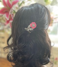 This is a unique handmade floral hair accessory, up cycled from an original  vintage brooch. This vintage up cycled silver tone flower hair comb features a pretty pink rose design set with marcasite stones with cold painted cerise pink and brown enamel. The perfect bridal hair accessory for a vintage inspired wedding.  These style brooches were popular in the 1950's and onward. The brooch pin is still intact and has been wired onto the hair comb, so that you could remove and wear again as a brooch if you wish.  What is marcasite? - Marcasite is a faceted grey stone called pyrite. All the stones are present but as a preloved, piece will show slight signs of wear relative to its age.  Vintage jewellery is another way to reduce your carbon footprint as these beautiful unique pieces have alrea Pink Rose Hair, Vintage Bridal Hair Accessories, Vintage Bridal Hair, Floral Wedding Hair, Theme Vintage, Marcasite Jewelry, Floral Hair Combs, Eco Wedding, Vintage Hair Combs