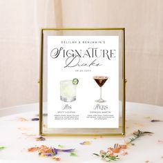 an elegant cocktail menu is displayed on a table with confetti and streamers