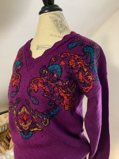 "Vintage Red V-Neck Sweater by Norton McNaughton Petites Fits a medium MEASUREMENTS: Pit to pit: 21\" Total length: 26\" Sleeve length: 20\" More vintage sweaters: https://www.etsy.com/shop/ElectricEyeThrift?sort_order=price_desc&search_query=sweater ✶ VINTAGE ✶ Please note that this item is vintage. Wear and tear representative of its age may be present. Anything major will be in the description, but please look closely at the photos. Feel free to send me a message or request additional photos. Fitted Bohemian V-neck Sweater, Multicolor Jacquard Knit V-neck Sweater, Purple Bohemian Long Sleeve Sweater, Purple Long Sleeve Bohemian Sweater, Purple Pullover, Baroque Design, Pullover Outfit, Oct 11, Sweater Vintage