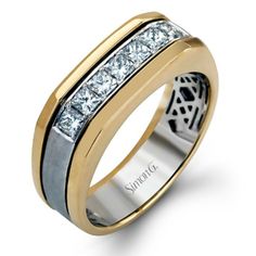 two tone gold and silver wedding ring with princess cut diamonds on the sides, set in 18k white and yellow gold