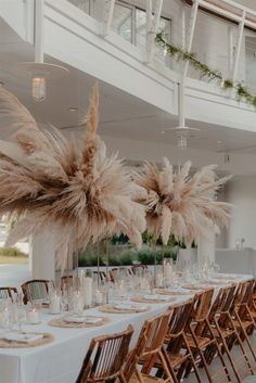 wedding reception photos, wedding photos, wedding photography, wedding photo shot list, boho wedding decor, wedding photo inspo, beach boho wedding, beachy boho wedding, boho wedding reception, boho wedding reception tables, pampas grass centerpieces, modern wedding decor Boho Wedding Fairy Lights, Table Settings Boho Wedding, Pampas Grass Reception Decor, Boho Reception Centerpieces, Boho Chic Reception Decor, Modern Boho Wedding Centerpieces, Boho Wedding Chairs, Pompass Grass Table Decor, Pampas Wedding Table Decor