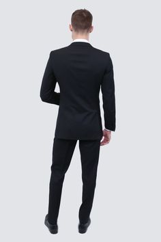 DESCRIPTION The Classic Black Notch Lapel Tuxedo sets the standard in formal ware for any special event. Our stretch blend tuxedos have a super formal look while feeling casual. We tirelessly evaluate thousands of fabrics before choosing the best in the industry. The satin lapel and stripe on the pant leg set this apart from a traditional suit taking your look to a whole new level Black Professional Sets For Business Casual, Formal Tuxedo Sets With Slim Fit, Black Slim Fit Office Sets, Classic Tailored Black Sets, Business Casual Tuxedo Sets In Suiting Fabric, Tailored Professional Tuxedo For Black-tie Events, Professional Solid Color Business Sets, Professional Tuxedo For Black-tie Events, Professional Business Sets In Solid Color