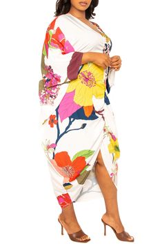 Enter the tropics everytime you slip into this vivid floral dress boasting a billowy caftan silhouette that's fit for your next paradise venture. V-neck Bracelet-length sleeves Unlined 95% polyester, 5% spandex Hand wash, line dry Imported Vibrant Spring Dress With Kimono Sleeves, Vibrant Floral Print Spring Kaftan, Spring Floral Print Vibrant Kaftan, Tropical Dress With Kimono Sleeves, Spring Tropical Dresses With Kimono Sleeves, Spring Tropical Kaftan With Kimono Sleeves, Tropical Spring Kaftan With Kimono Sleeves, Tropical Kaftan With Kimono Sleeves For Spring, Multicolor Tropical Print Kaftan For Spring