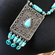 ON SALE Very pretty aqua beaded bohemian statement pendant necklace in excellent vintage condition. Measures 25 inches long and the pendant portion measures 4 1/2 inches long by 2 1/2 inches wide. Very pretty BoHo style jewelry piece. Blue Turquoise Pendant Necklace For Festivals, Vintage Blue Beaded Turquoise Necklace, Turquoise Bohemian Beaded Necklace With Large Pendant, Bohemian Turquoise Beaded Necklace With Large Pendant, Blue Bohemian Beaded Necklace With Large Pendant, Bohemian Blue Beaded Necklaces With Large Pendant, Bohemian Blue Beaded Necklace With Large Pendant, Bohemian Blue Necklace With Large Pendant, Vintage Turquoise Beaded Necklaces