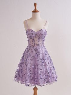 Step into a world of whimsical elegance with "Elowyn," a breathtaking cocktail dress crafted from sparkling glitter tulle. Available in enchanting shades of Lavender, Ivory, and Green, this A-line dress captures the essence of feminine charm. The sweetheart neckline and spaghetti straps create a classic, romantic silhouette, while the lace-up back ensures a perfect fit. Delicately adorned with intricate floral appliques, Elowyn is a dreamy choice for prom, homecoming, or any enchanting evening. Whimsical Cocktail Dress, Hoco Dresses Sweetheart Neckline, Homecoming Dresses For Hip Dips, Elegant Dresses For Prom Short, Unique Short Prom Dresses, Tangled Theme Hoco Dress, Sweet 16 Short Dresses