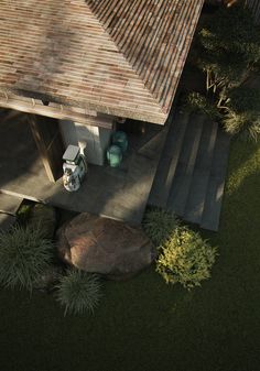 an aerial view of a house with stone steps