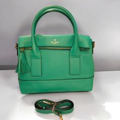 Kate Spade Southport Avenue Carmen Bag In Vibrant Green. Features Pebble Embossed Cow Hide Leather With Matching Trim, Signature 14k Light Gold Plated Hardware, Custom Woven Bookstripe Lining, Flap And Zip Closure, With Double Carry Handles And Adjustable Crossbody Strap. Can Be Carried & Styled Several Different Ways. Interior Slide & Zip Pockets, Tassel Accent. Could Be Described As A Semi Structured Hobo Style Bag.... Nwot However Please Read About & See Flaws * There Are Double Rub Marks On Luxury Green Kate Spade Shoulder Bag, Kate Spade Green Office Bag, Green Kate Spade Office Bag, Kate Spade Green Leather Shoulder Bag, Kate Spade Green Bag With Detachable Handle, Kate Spade Green Bag With Detachable Strap, Kate Spade Green Double Handle Bag, Kate Spade Green Crossbody Shoulder Bag, Kate Spade Green Shoulder Bag For Errands