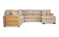 Reach your reading goals with my Playday sectional. Grab your newest novel from the built-in bookshelf and get set up on the Bob-O-Pedic Memory Foam cushions, after snagging your softest blanket from the storage chaise. If you're looking for even more comfort, fluff up the included accent pillows and stretch out on the pop-up sleeper with a cozy drink in the cupholders of the drop-down table. | Playday Beige 128'' 4 Piece Right Arm Facing Pop-Up Sleeper Chaise Sectional Sofa with USB & USB-C Port | Memory Foam | by Bob's Discount Furniture Softest Blanket, Chaise Sectional Sofa, Drop Down Table, Cozy Drinks, Storage Chaise, Reading Goals, Bob's Discount Furniture, Chaise Sectional, Mattress Store