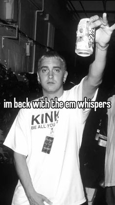 a man holding up a can of beer in his hand with the caption i'm back with the men whisperers