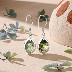 Green Moss Agate Earrings, embrace nature's elegance with our moss agate earrings, featuring pear-cut green gems set in lustrous sterling silver. These 925 moss agate dangle earrings are a perfect blend of earthy charm and refined grace, ideal for both casual and formal wear. Elevate your style with these exquisite moss agate drop earrings in silver or gold. Handmade High quality 925 sterling silver unique handcraft for you with Free gift package TECHNICAL INFORMATION - Stone height with outside case is 0.83 inches (21mm) and Stone width with outside case is 0.52 inches (13mm) - Finishing Options: Sterling silver, 14K Gold vermeil, or Rose Gold vermeil (If you would like solid gold option, please contact with me ) Package contain Original Box, Certificate of Jewelry, Pouch and care cloth p Green Teardrop Nature-inspired Jewelry, Nature-inspired Green Teardrop Jewelry, Teardrop Earrings For May Birthstone Gift, Nature-inspired Green Teardrop Earrings, Green Moss Agate Earrings For Gift, Moss Agate Jewelry, Green Moss Agate, Agate Earrings, Green Gems