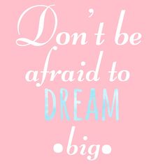 the words don't be afraid to dream big on a pink background