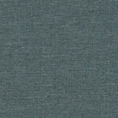 an upholstered gray fabric textured with small squares