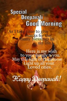 happy deepavali good morning wishes with candles and flowers on the ground in front of it